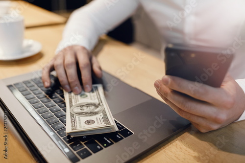 man Hands using laptop.