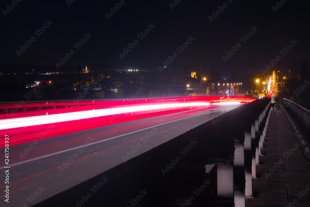 Obraz premium Car lights in a night background, long exposition