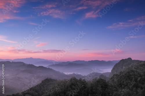 sunrise at Ban Ja Bo, mountain view misty morning above hill tribes village and top mountain around with sea of mist with colorful vivid sky background, Ban jabo village, Mae Hong Son, Thailand.