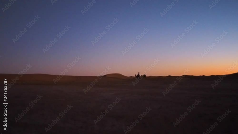 Camel Rider In Desert Far Away Sunset Dusk Camel Rider In Desert Far Away Sunset Dusk