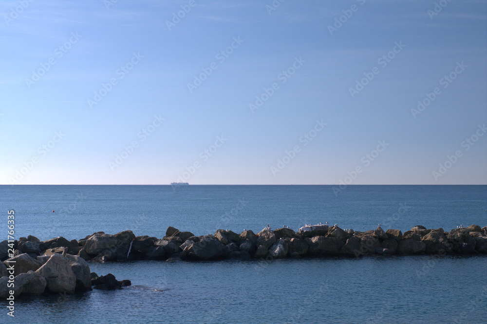 sea and sky,container ship,horizon,view,blue,stone,seascape