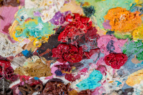 Closeup oil paints on wooden palette