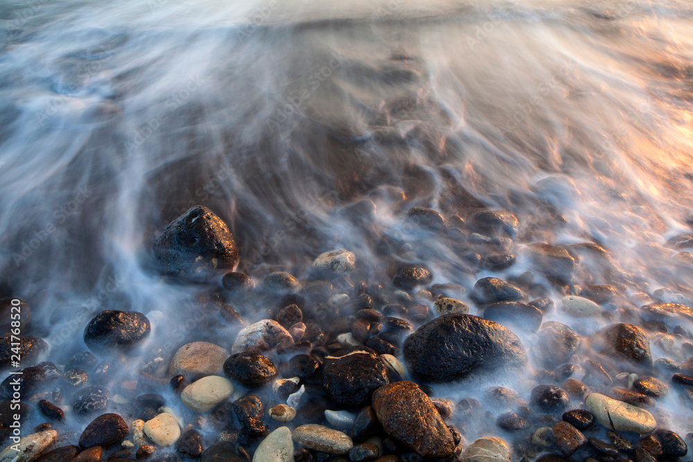 Santa Cruz Island, Channel Islands National Park, California: Sunrise on rocks in Scorpion Anchorage. Santa Cruz Island, Channel Islands National Park, California: Sunrise on rocks in Scorpion Anchorage.