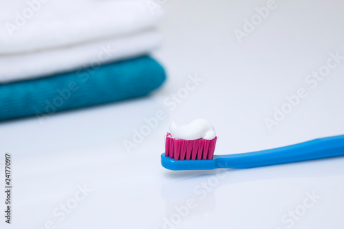 Colorful toothbrushes on a light background