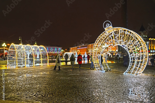 KALININGRAD, RUSSIA - DECEMBER 24, 2018: The shining arches at Victory Square in the winter evening
