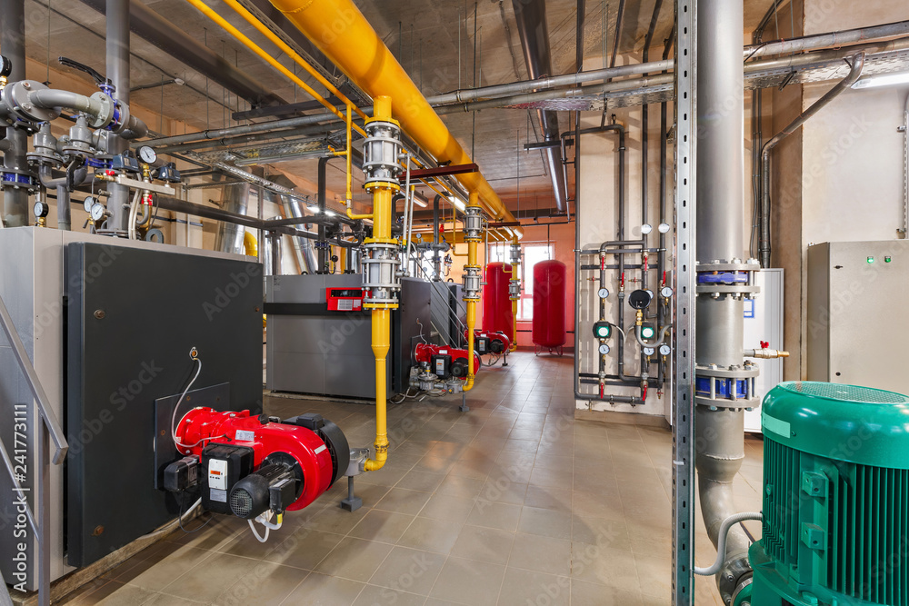 interior of industrial, gas boiler room with boilers; pumps; sensors and a variety of pipelines interior of industrial, gas boiler room with boilers; pumps; sensors and a variety of pipelines