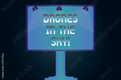 Word writing text Drones In The Sky. Business concept for Aerial helicopter modern device taking pictures and video Blank Lamp Lighted Color Signage Outdoor Ads photo Mounted on One Leg