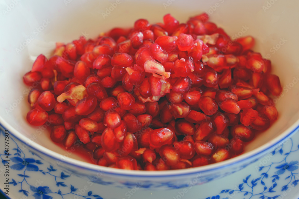 Bowl of freshly open pomegranate seeds Bowl of freshly open pomegranate seeds