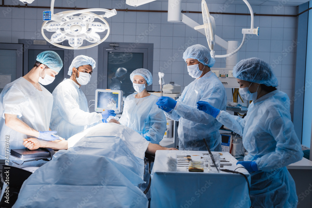 Professional team of anesthetists at work the choice of anesthesia is