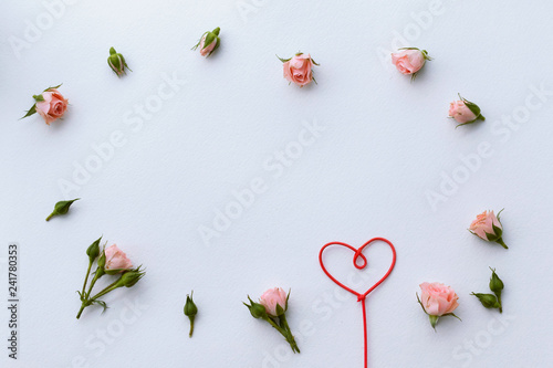 Greeting card for Valentine s Day  rosebuds  heart  love  background. Place for text.