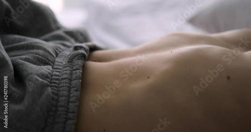 Male abdomen breathing closeup, including original audio