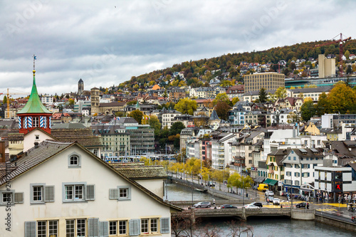 ZURICH, SWITZERLAND - OCT 130th, 2018: Classic beautiful and colorful swiss cityscape or landscape at rainy autumn day