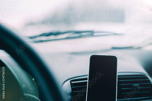 smartphone navigation in the car. © velimir