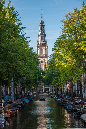 Canvas Print view over a canal in amsterdam - Zuiderkerk church in the background