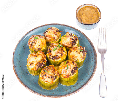 Zucchini stuffed with minced meat and vegetables