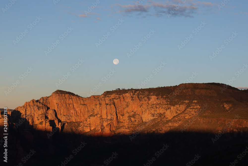 Moon Setting as the Sun Rises Over Sedona Arizona from Schnebly Hill Road