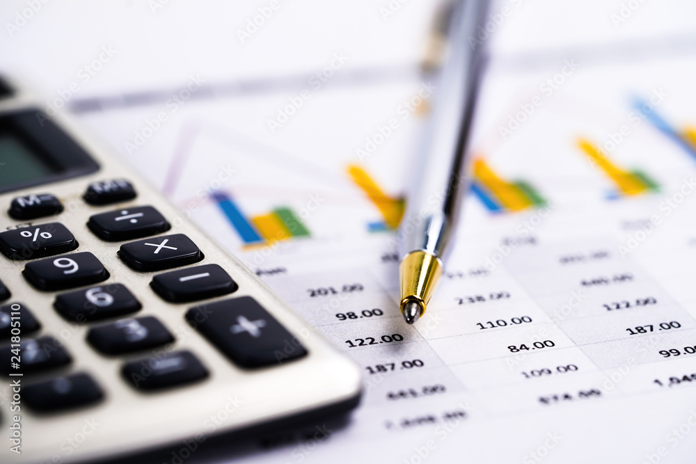 Saving stack coins money, Calculator, Charts and Graphs spreadsheet paper. Finance, Account, Statistics, Analytic research data and Business company meeting concept Saving stack coins money, Calculator, Charts and Graphs spreadsheet paper. Finance, Account, Statistics, Analytic research data and Business company meeting concept