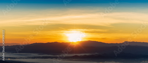 Beautiful foggy winter sunrise in mountains of north Thailand.