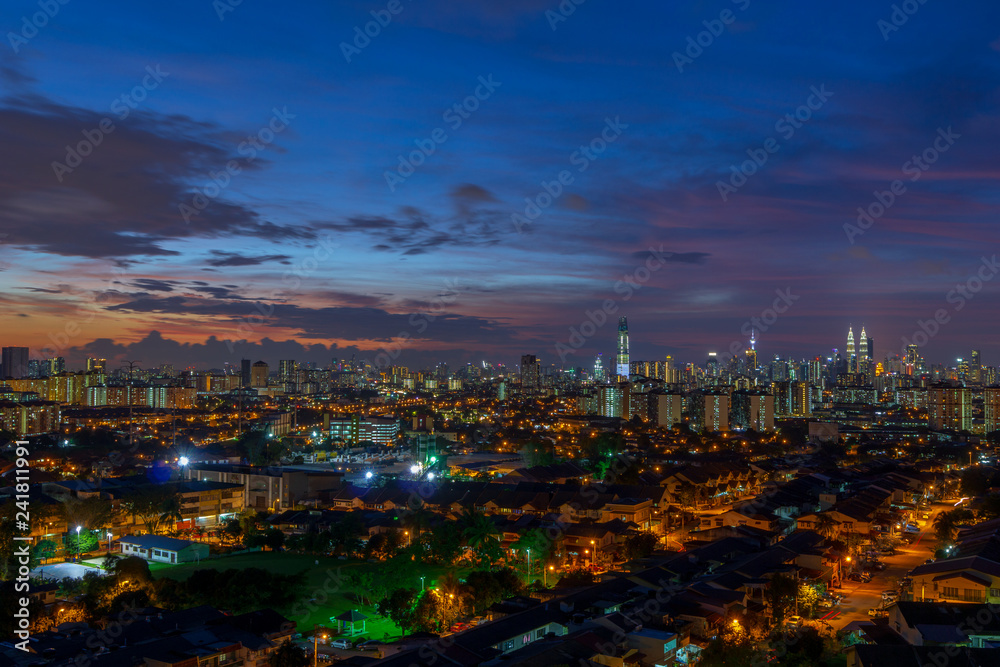 Night view of downtown Kuala Lumpur, a capital of Malaysia. Its modern skyline is dominated by the 451m-tall Petronas Twin Towers.	