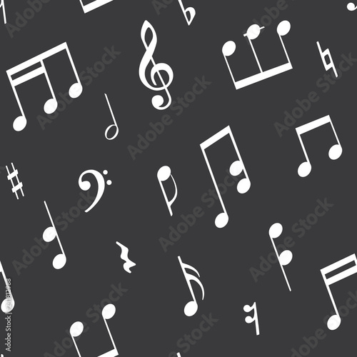 Seamless pattern with musical signs such as notes, treble clefs, bass keys photo