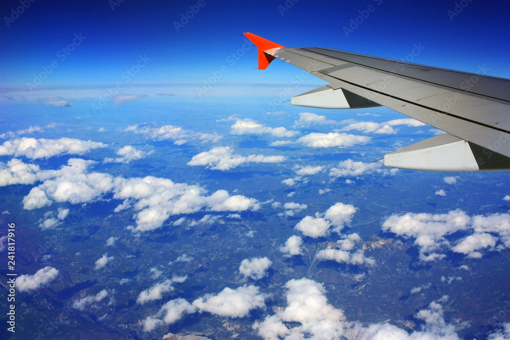 Fototapeta premium Airplane wing in the sky