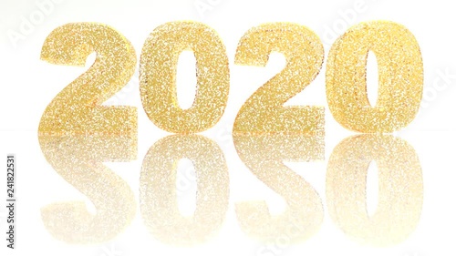New year 2020 made with little gold tiles or particles