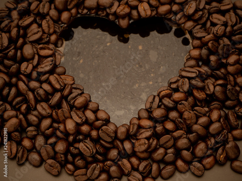 heart coffee bean inside water.