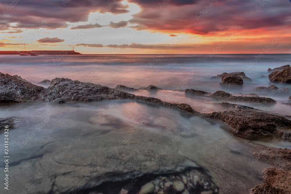 Obraz premium Long Exposure of the Mediterranean Coast of Southern Italy at Sunset
