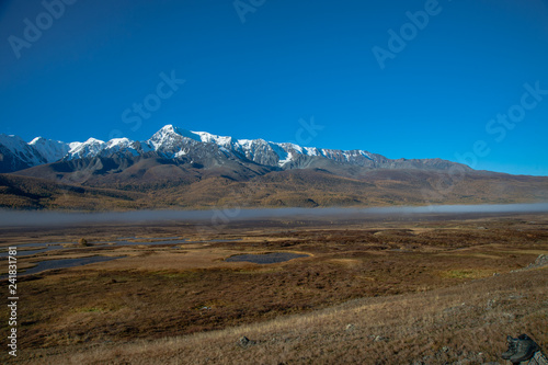 Altai. Lake at the foot of the mountains