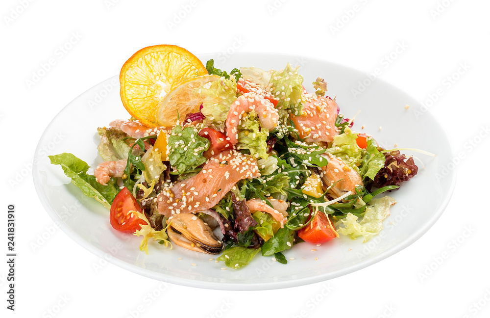 Salad with salmon and seafood. On a white background Salad with salmon and seafood. On a white background