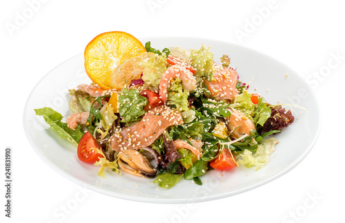 Salad with salmon and seafood. On a white background