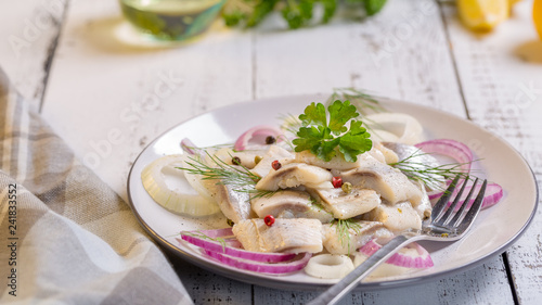 Obraz na płótnie Plate of herring with oil and onion, greek style food. w salonie