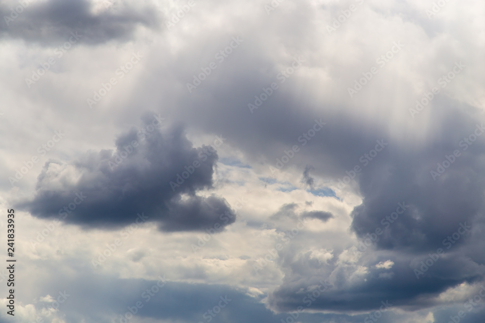 Fototapeta premium Clouds after rain before sunset as a background