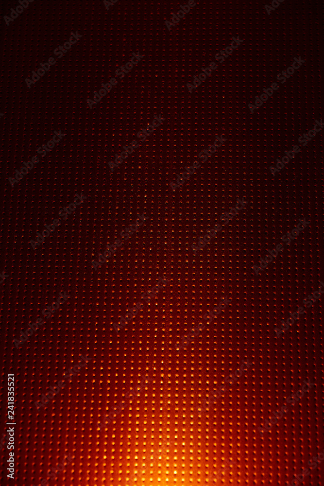Yellow glow on a red checkered background