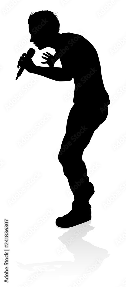 Obraz premium A singer pop, country music, rock star or hiphop rapper artist vocalist singing in silhouette