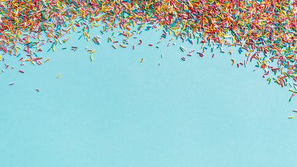 Birthday and party concept background with confetti frame on blue