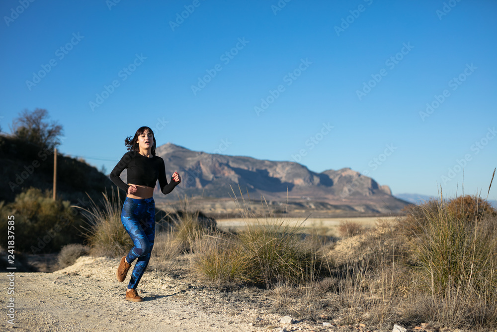 Woman doing sport and relaxing outdoors