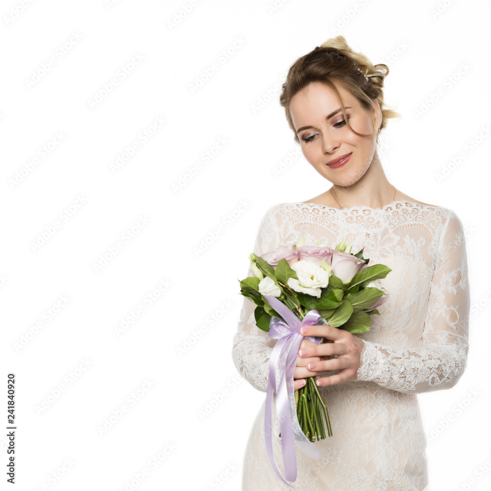 Beautiful bride with wedding bouquet in her hands. free space for your text Beautiful bride with wedding bouquet in her hands. free space for your text