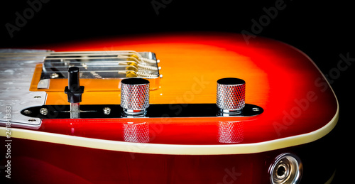 Macro Close up of a electric guitar volume and tone knobs