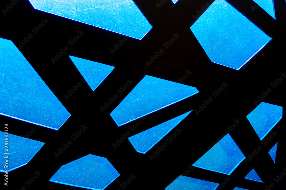 Blue abstract geometric shapes on black. Abstract blue light shapes. Abstract background. Blue abstract geometric shapes on black. Abstract blue light shapes. Abstract background.