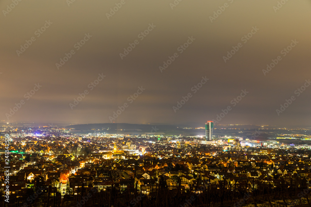 Obraz premium Germany, City lights of fellbach from above in cold winter night