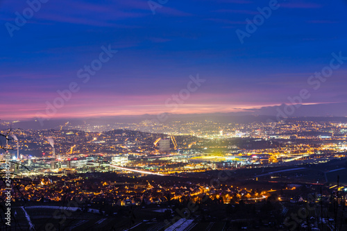 Germany, Colorful sunset sky over stuttgart city in winter night
