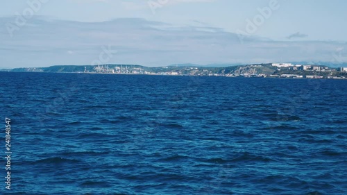 Coast of the Sakhalin island. Aniva bay. Korsakov city near coast. photo