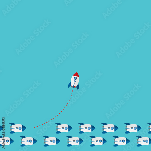 Think differently concept. Be different. Red rocket changing direction. New idea, change, trend, courage, creative solution, innovation and unique way concept.