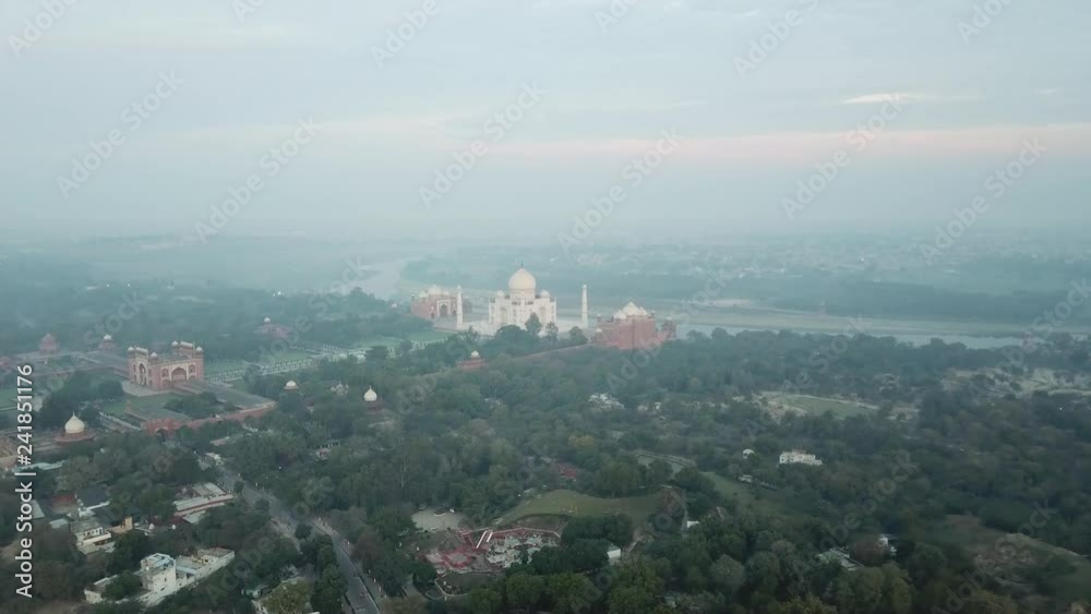 Aerial View of Agra Approaching Taj Mahal and Yamuna River and Green trees Aerial View of Agra Approaching Taj Mahal and Yamuna River and Green trees