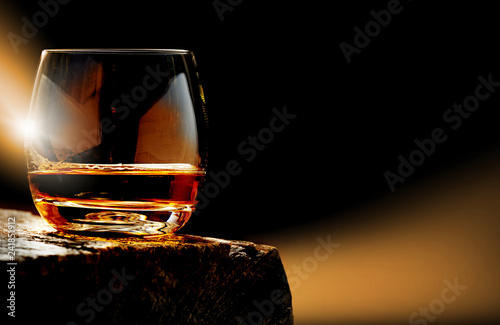 Whisky, whisky glass on the wooden table