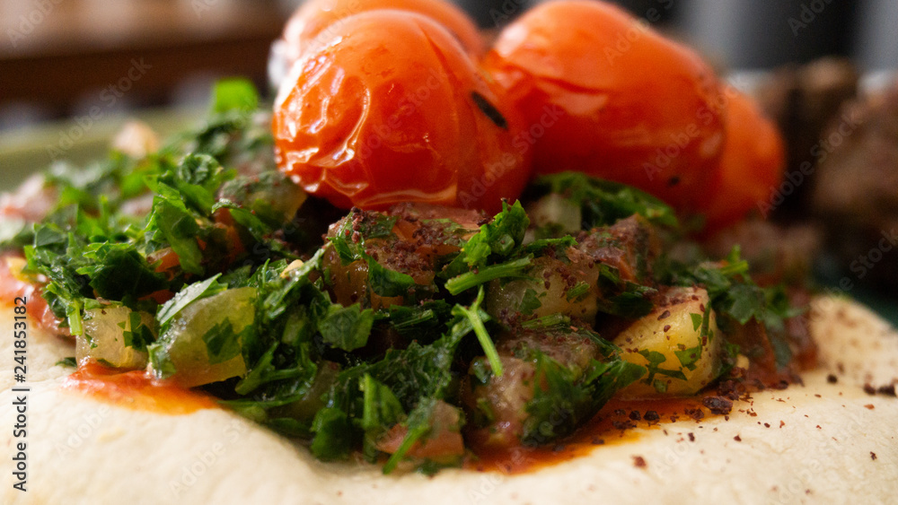Typical Lebanese dish based on pieces of meat is roasted minced meat