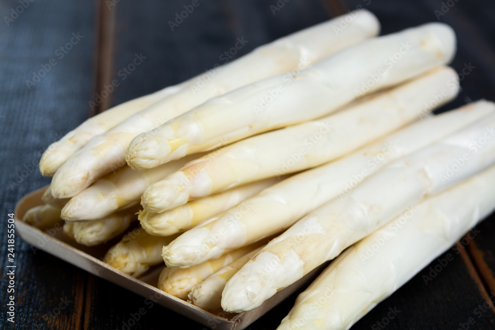 Fresh tasty white asparagus, seasonal vegetable, new harvest, ready to cook Fresh tasty white asparagus, seasonal vegetable, new harvest, ready to cook