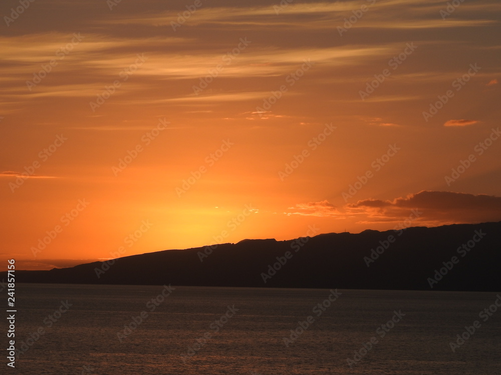 sun setting over the sea