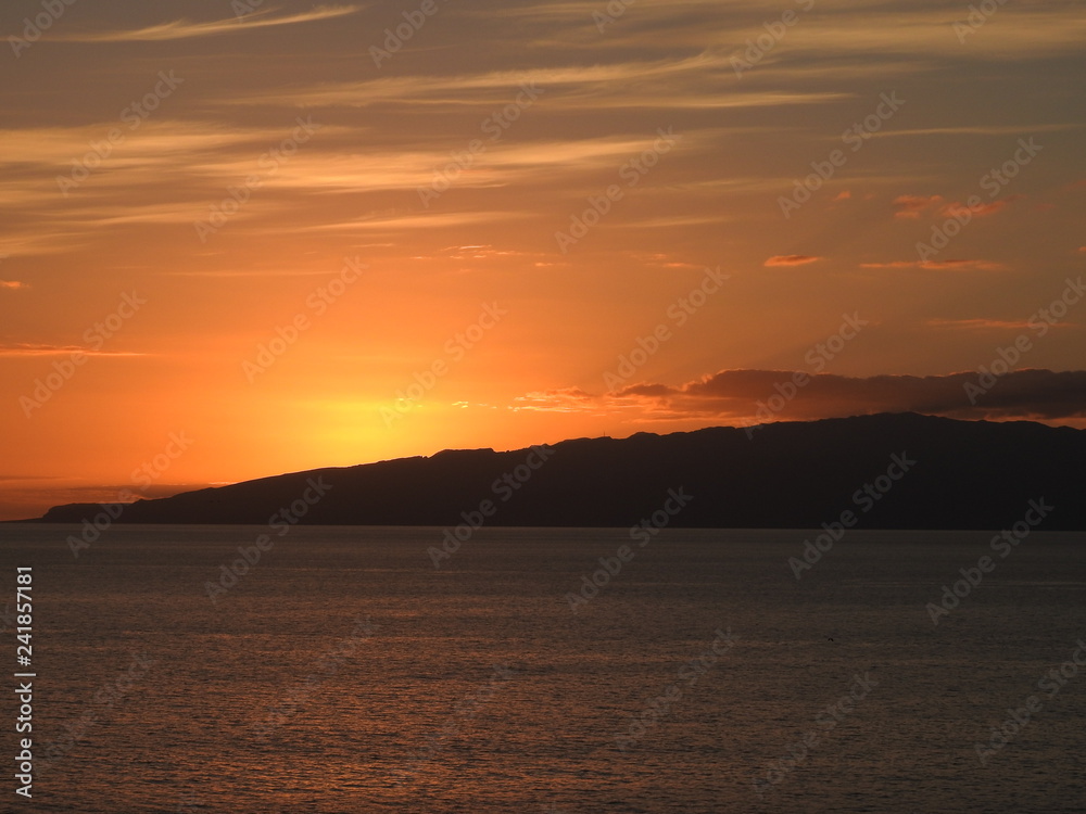 sun setting over the sea